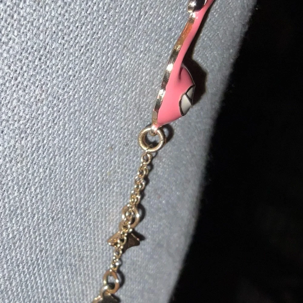 Pink flamingo pendent/ charm with dangling chain legs on a 21 inch gold chain